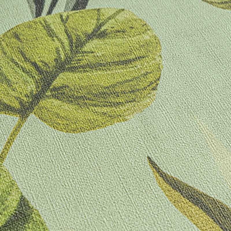Tropische Tapete mit großflächigem Blattmotiv in Grüntönen auf mintgrünem Grund livingwalls (782191)
